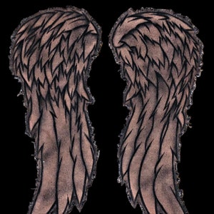May include: A pair of brown and black angel wings with a distressed, worn look. The wings are made of fabric and have a jagged edge.