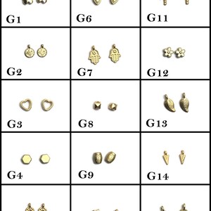May include: Assortment of 15 gold-tone metal charms, including butterflies, hearts, hands, flowers, leaves, stars, horseshoes, and more.  These charms are perfect for jewelry making, scrapbooking, and other craft projects.