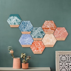 Map gifts for him or her displayed as engraved wood hexagons – a perfect 5th wedding anniversary or first kiss location gift.