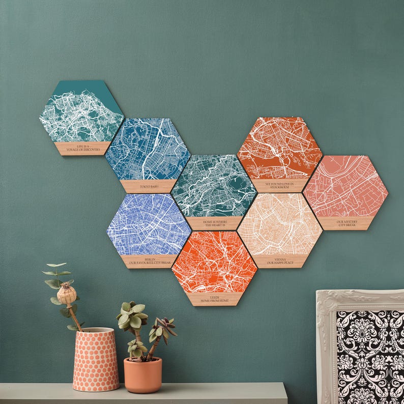 Map gifts for him or her displayed as engraved wood hexagons – a perfect 5th wedding anniversary or first kiss location gift.