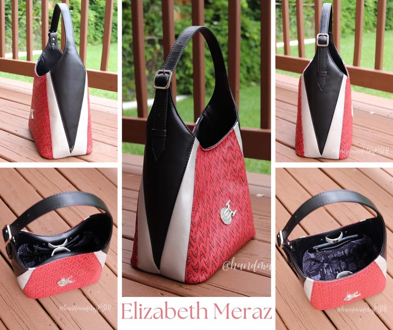 May include: A stylish handbag with a black leather handle and trim, a white panel, and a textured red body. The bag features a silver-tone clasp and a decorative emblem. The name "Elizabeth Meraz" is displayed at the bottom.