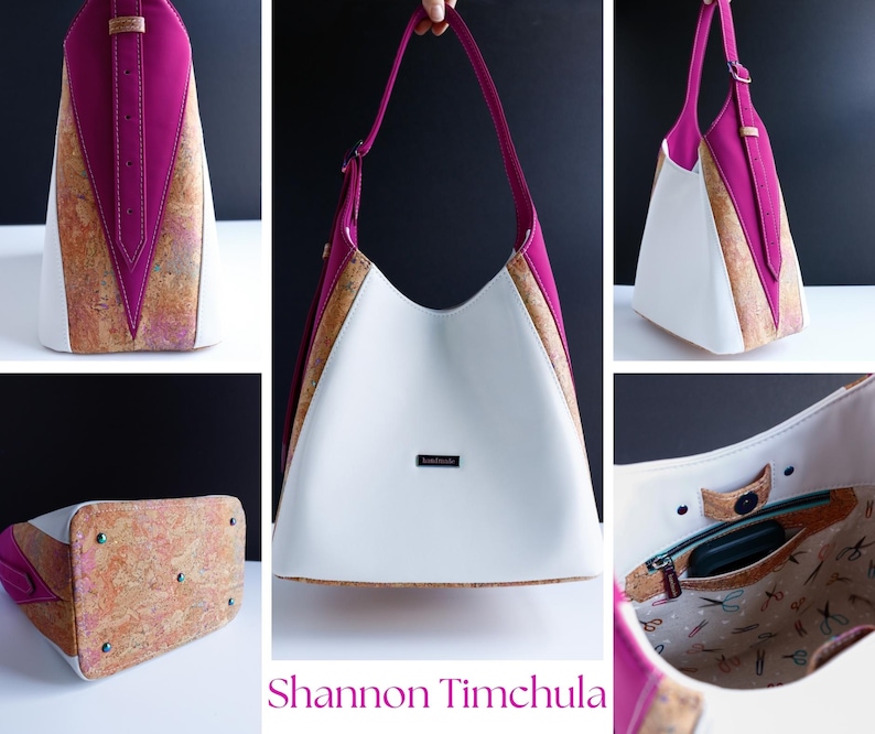 May include: A white, pink, and cork shoulder bag with a unique design. The bag features a white body, pink accents, and cork detailing. The bag has a long strap and a small label. The bag is shown from multiple angles.