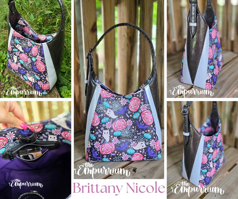 May include: A black and silver shoulder bag with a Halloween-themed pattern featuring pumpkins, ghosts, and bats. The bag has a light blue panel and a black strap. The text "Brittany Nicole" is visible.