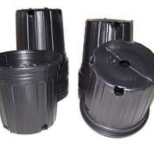 May include: A collection of black plastic plant pots. The pots are cylindrical with vertical ridges and drainage holes. One pot is upright, while others are stacked or tilted, showcasing their design and structure.