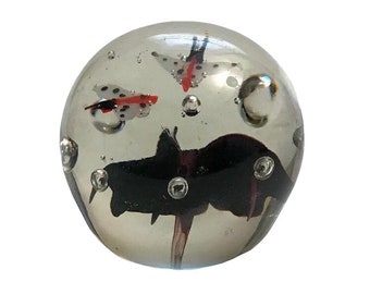 Vintage art glass paperweight with butterflies and purple flower