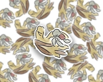 Puede incluir: Un conjunto de pegatinas de acuarela con un diseño floral estilizado en tonos marrones y beige. Las flores tienen un centro rosa claro y están rodeadas de hojas marrones.