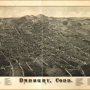 May include: A vintage black and white bird's-eye view map of Danbury, Connecticut. The map shows the town's layout with streets, buildings, and surrounding countryside. The text "Danbury, Conn." is printed in large, bold letters at the bottom center of the map.