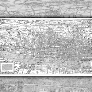 May include: A black and white detailed map of a city with a river running through it. The map is surrounded by a border with a coat of arms at the top left and right corners.