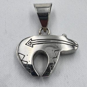 Bear pendant in sterling silver by Ray Tracey Knifewing