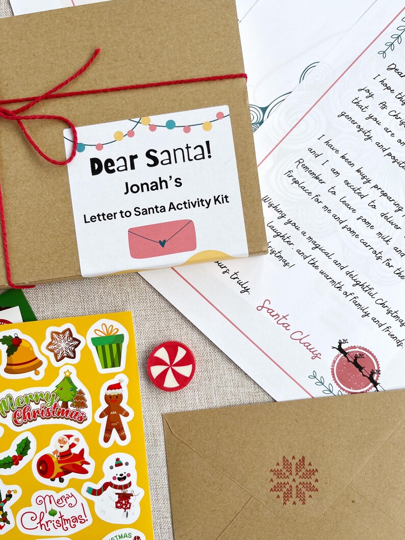 close up of the Smallkind personalised letter to santa christmas activity kit including a gift box, personalised letter from santa and christmas stickers