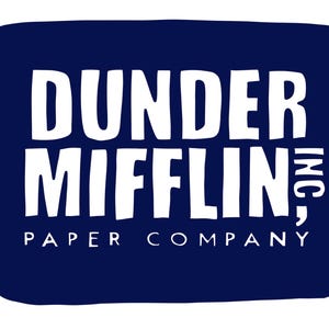 May include: A navy blue logo with white text that reads "Dunder Mifflin, Inc. Paper Company".