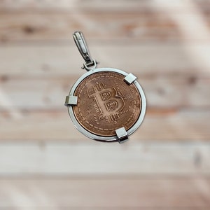 Coin Pendant. Copper one ounce coin.