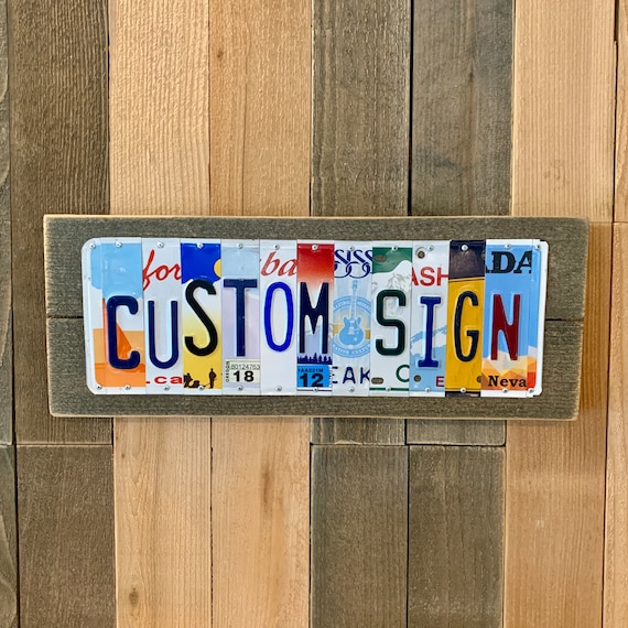 License plate clearance name signs
