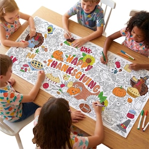 May include: A large rectangular paper coloring poster featuring a Happy Thanksgiving theme with illustrations of turkeys, pumpkins, pies, and autumn leaves. The design includes the text Happy Thanksgiving, Fun, and Love, with various markers scattered.