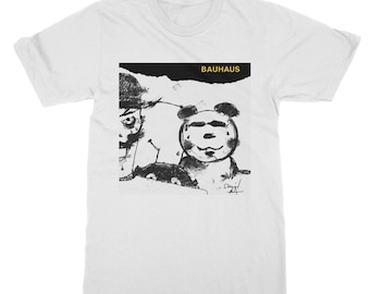 May include: White t-shirt with a black and white illustration of a panda and a person. The text "BAUHAUS" is printed in yellow on the shirt.