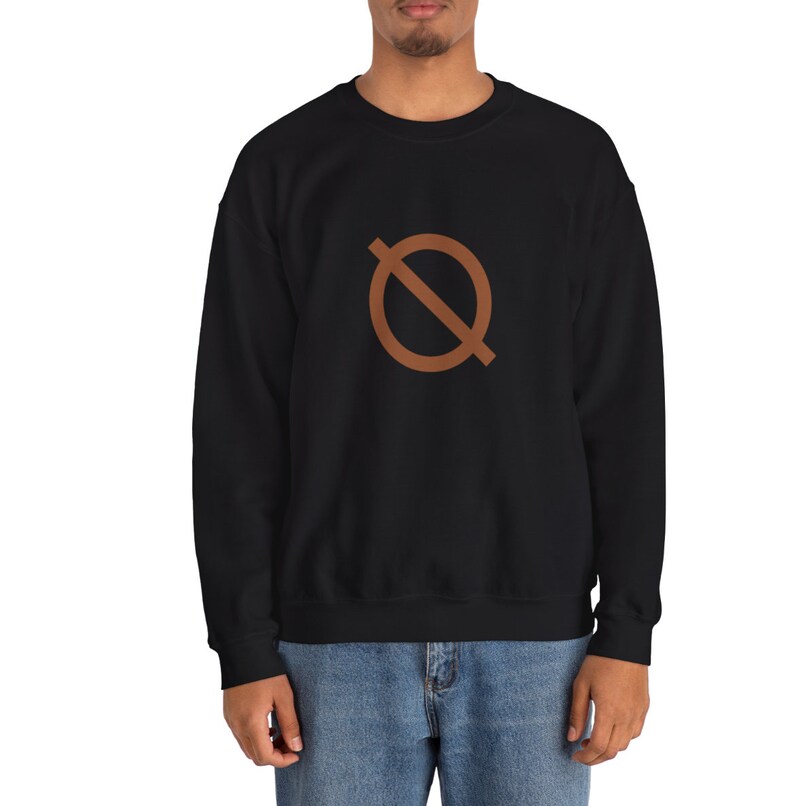 May include: Black sweatshirt with a brown circle and a line through it. The sweatshirt is a crew neck style and is made of a soft material. The design is centered on the chest.