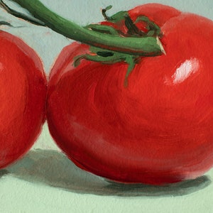 May include: Two red tomatoes on a green surface. The tomatoes are attached to a green vine.