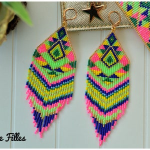 May include: A pair of long, colorful beaded earrings with a geometric pattern in shades of pink, green, yellow, and blue. The earrings are made with small seed beads and have a gold-tone hook closure.