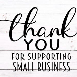 May include: Black and white text on a white wood background that reads "Thank You for Supporting Small Business".