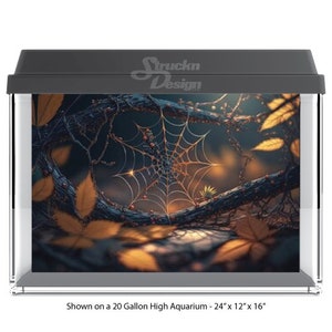 May include: A 20-gallon high aquarium with a black frame and a background image of a spider web with a dark forest scene. The aquarium is 24 inches long, 12 inches wide, and 16 inches high.