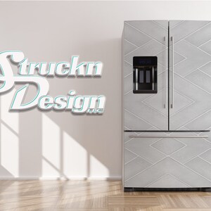 May include: A white refrigerator with a stainless steel finish and a geometric pattern on the doors. The refrigerator has a water and ice dispenser on the door. The refrigerator is in a white room with a wood floor. The logo "Struckn Design LLC" is on the wall.
