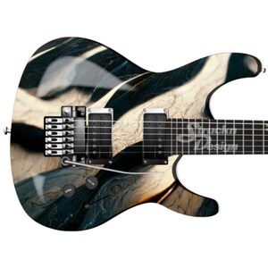 May include: A black and white electric guitar with a swirling, abstract design. The guitar has a black body and a white pickguard. The guitar has a black neck and a black headstock. The guitar has a black bridge and a black pickup.