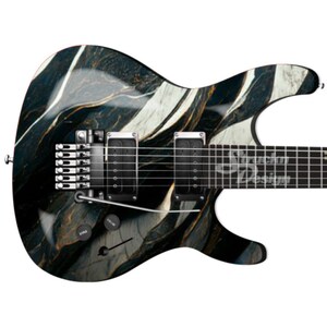 May include: Black electric guitar with a white and gold marble design. The guitar has a black body and a black neck with silver hardware.