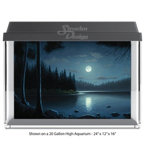 May include: A black and gray aquarium with a nighttime scene of a lake and forest. The lake is calm and reflects the moon and stars. The forest is dark and mysterious. The aquarium is 24 inches wide, 12 inches deep, and 16 inches tall. It is shown on a 20 gallon high aquarium.