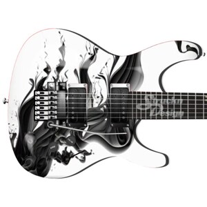 May include: A white electric guitar with a black and white abstract design. The design features swirling lines and shapes that resemble smoke or liquid.