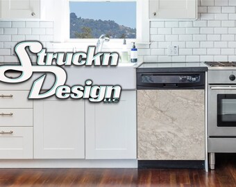 May include: A kitchen scene featuring a dishwasher with a marble-patterned front panel. The kitchen has white cabinets, a stainless steel oven, and a window with a view of a mountain. The text "Struckn Design LLC" is displayed in the upper left corner.