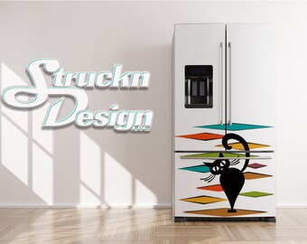 May include: A white refrigerator with a black cat design on the door. The cat is standing on a series of colorful geometric shapes. The refrigerator has a water dispenser and ice maker.