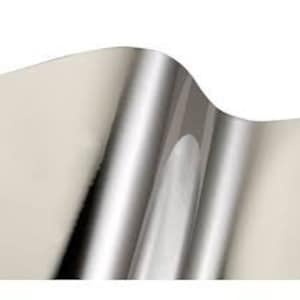May include: A roll of silver adhesive vinyl with a glossy finish.