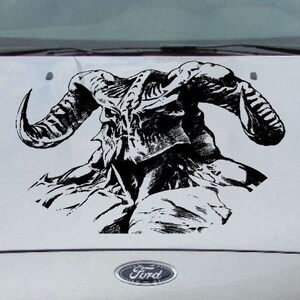 May include: Black and white illustration of a demon with large horns and a fierce expression. The demon is depicted in a menacing pose, with its horns pointing upwards and its mouth open in a roar.