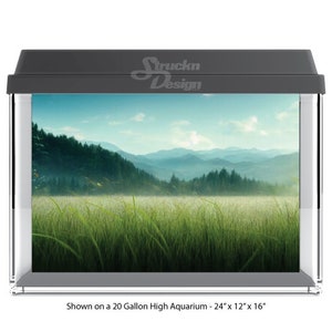 May include: A scenic mountain landscape backdrop for a 20-gallon high aquarium, measuring 24 inches by 12 inches by 16 inches. The image features a lush green field with a misty background of rolling hills and trees.