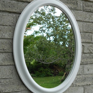 White Frame Wall Oval Mirror.