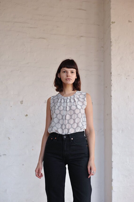 grey polka dot blouse