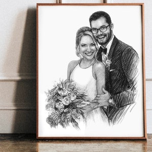 May include: A black and white pencil drawing of a couple in formal attire. The woman is wearing a white dress and holding a bouquet of flowers. The man is wearing a suit and tie. The drawing is framed in a wooden frame.