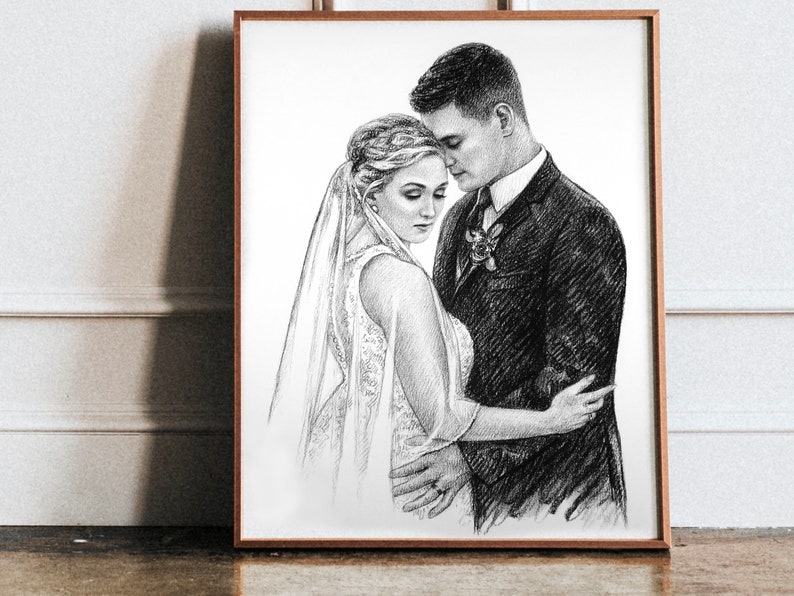 May include: A black and white pencil drawing of a bride and groom embracing. The bride is wearing a white dress and veil, and the groom is wearing a suit. The couple is looking at each other with love and affection.