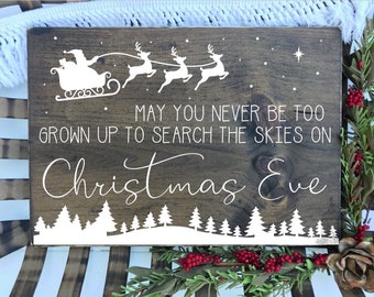 May you never be too grown up to search the skies on Christmas Eve | Inspirational Christmas Sign