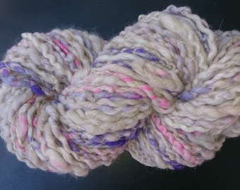 Funky Art yarn merino wool and alpaca. Hand-spun and hand-dyed, bright pink, purple and white. 225 grams, 85 metres. By Soft Senses Yarn