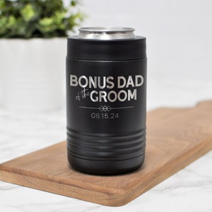 May include: Black stainless steel can cooler with the text "Bonus Dad of the Groom" and the date "08.15.24" engraved on it.