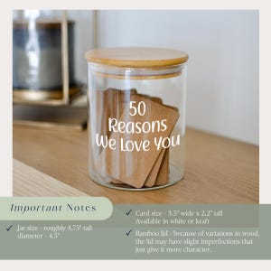May include: A clear glass jar with a bamboo lid, containing kraft paper cards. The jar is labeled "50 Reasons We Love You." The jar is roughly 4.75 inches tall with a 4.5-inch diameter. The cards are 3.5 inches wide and 2.2 inches tall.