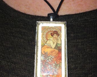 Alphonse Mucha Precious stones and flowers series 'Topaz' Art Nouveau glass pendant on leather cord/ silver plated chain (both included)