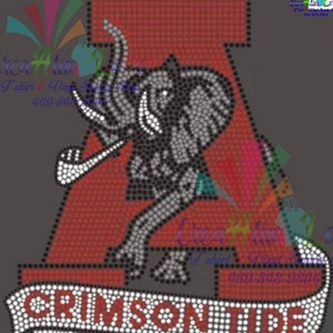 May include: A red and black rhinestone design of the letter A with an elephant inside. The elephant is gray and black. Below the letter is a white banner with the words "Crimson Tide" in black rhinestones.