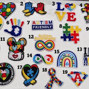 May include: A collection of twenty embroidered patches featuring autism awareness themes, including puzzle piece hearts, infinity symbols, rainbows, and text such as Autism Friendly, Love, and I Love Someone With Autism, in vibrant primary colors.