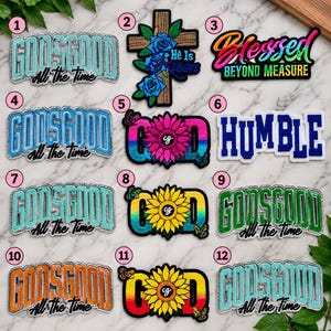 May include: A collection of twelve embroidered patches featuring various designs including text that reads God Is Good All The Time, Blessed Beyond Measure, Humble, and God with sunflower or cross motifs in vibrant colors like blue, pink, and yellow.