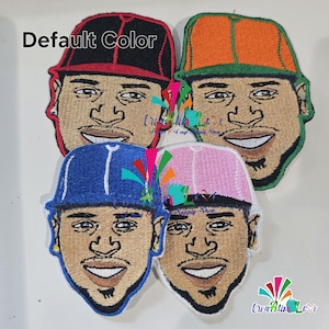 May include: Embroidered patches featuring a smiling face wearing a cap. The caps are in various colors: black, orange, blue, and pink. The text "Default Color" is above the patches.