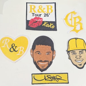 May include: A collection of six embroidered patches featuring a square patch with text R&B Tour 26' and a red lip icon, a yellow heart patch with R&B text, a yellow GB monogram, two portrait patches of men, and a rectangular patch with Usher text.