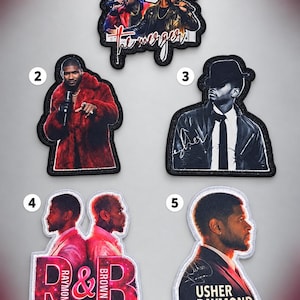May include: Five rectangular and shaped fabric patches featuring musical artists. Patch 1 shows two performers with text R&B TOUR the merger. Patch 2 shows a performer in a red fur coat. Patch 3 shows a performer in a hat. Patch 4 shows two profiles with text R&B RAYMOND & BROWN TOUR. Patch 5 shows a profile with text USHER RAYMOND.
