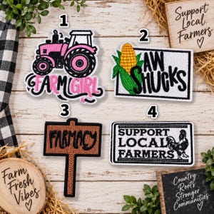 May include: Four embroidered patches featuring farm-themed designs. Patch 1 shows a pink tractor with the text FARM GIRL. Patch 2 is a rectangular sign with a corn cob and the text AW SHUCKS. Patch 3 is a brown sign with the text FARMACY. Patch 4 reads SUPPORT LOCAL FARMERS with a rooster graphic.